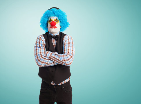portrait of a funny clown over white