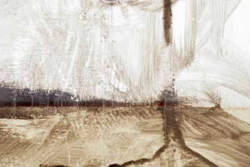 Brushstroke with brown paint  on dusty metal fence