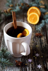 Obraz na płótnie Canvas Winter hot drink with cinnamon and orange