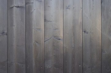 Dark background vertical old pine boards