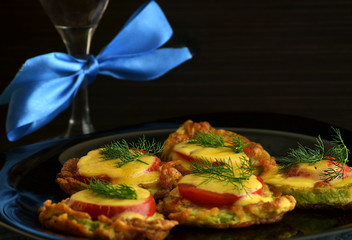 appetizer of  zucchini tomato and cheese