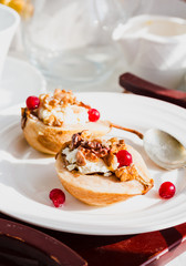 Baked pears with ricotta, walnuts, honey and cranberries,selecti