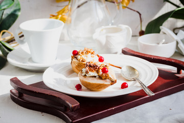 Baked pears with ricotta, walnuts, honey and cranberries