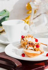 Baked pears with ricotta, walnuts, honey and cranberries