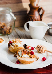 Baked pears with ricotta, walnuts, honey and cranberries