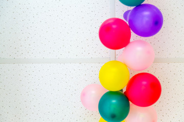 Colorful balloons on ceiling