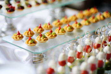 Plates with assorted snacks on an event party