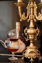 Fototapeta na wymiar old cognac and candle