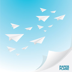 paper airplane in  sky