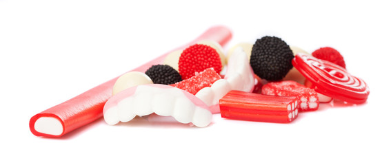 mixed group of candies on a white background