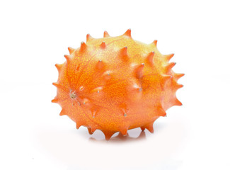 Melano or kiwano melon on white background