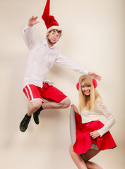 Obraz premium Happy active couple dancing and jumping.