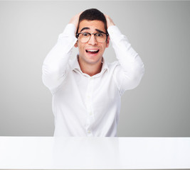 man worried on table