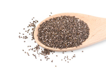 Chia seeds in a wooden spoon isolated on a white background.