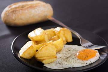 Fried potato and eggs