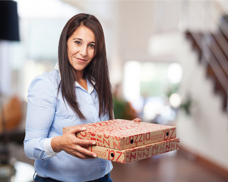 Woman Holding Pizza Boxes