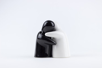 Two porcelain men on a white background