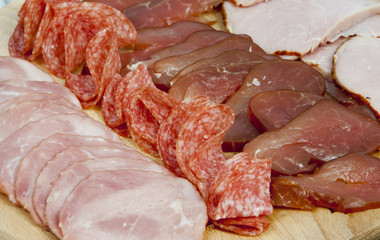 Salami sausage slicesand ham