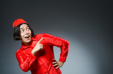 Man wearing red fez hat