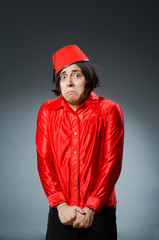 Man wearing red fez hat