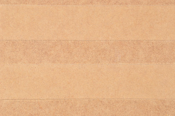 Chipboard background from old processing trash paper and wood