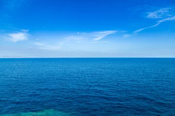 Foto auf Alu-Dibond Blue sea waters and clear blue sky horizon © viperagp