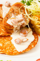 potato pancakes with meat sauce