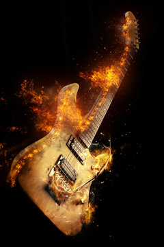 Electric Guitar in fire Isolated on Black