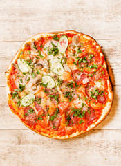 pizza on the wood background