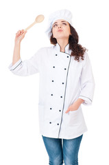 Woman chef with wooden spoon