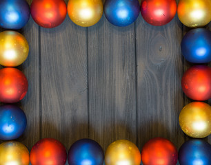 New year theme: christmas decor with balls on retro stylized wood background