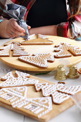 Decorating gingerbread cookies.