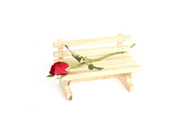 Stock Photo:.Beautiful red roses in a vase isolated on white