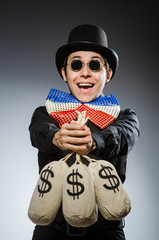 Funny man with money dollar sacks