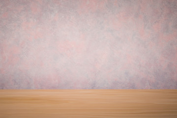 concrete wall and wooden table