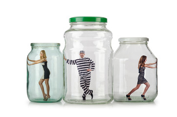 People trapped in the glass jar