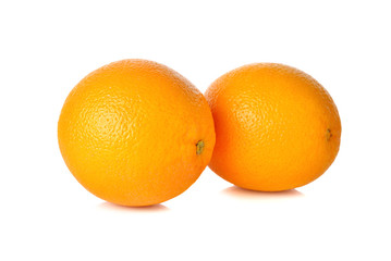 whole ripe orange on white background