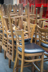 Stackable wood chairs in restaurant