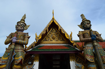 Fototapeta na wymiar Two giants in front of Thai temple