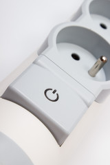 Electrical power strip with switch on-off on white background