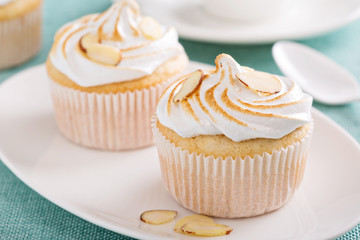 Almond cupcakes with meringue tops