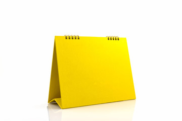Yellow blank paper desk spiral calendar.
