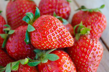 Fresh strawberries on wooden table