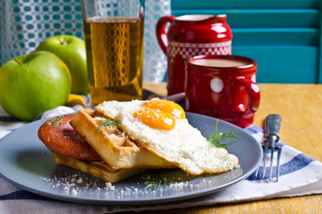 Waffles with sausage and eggs
