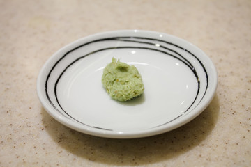 Bowl with Wasabi on table