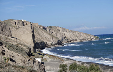 wild coast of santorini island near perissa