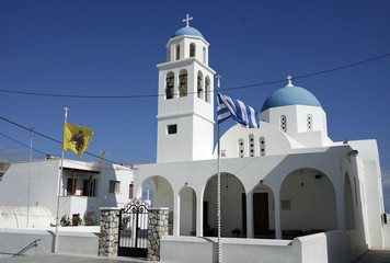 traditional church in small greece village on santorini