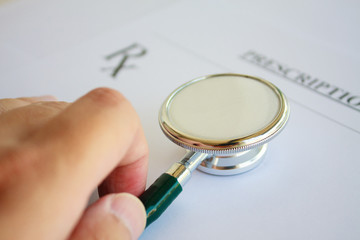 Blank medical prescription with stethoscope