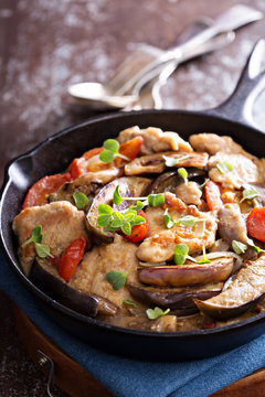 Chicken with tomatoes and eggplant