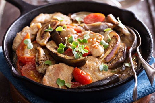 Chicken with tomatoes and eggplant